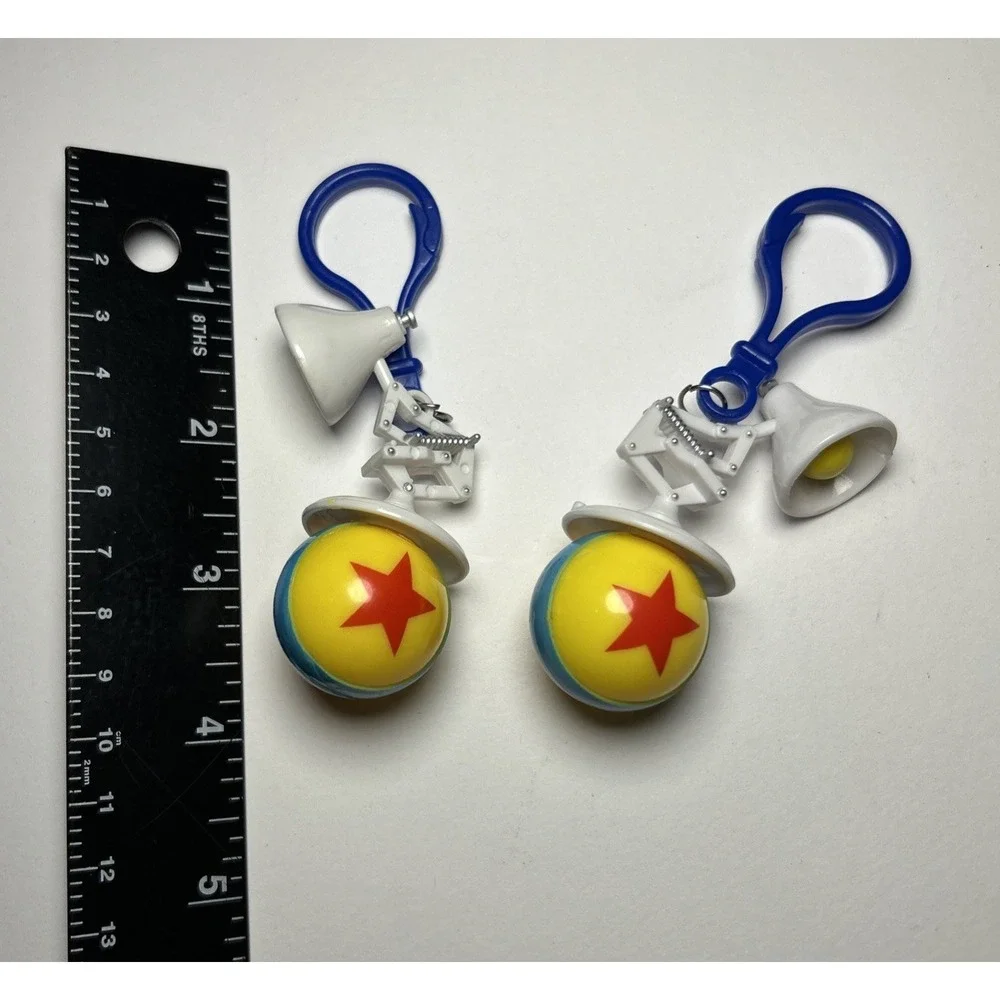 Set Of Two Disney Pixar Lamp & Ball Plastic Bag Clip Keychain